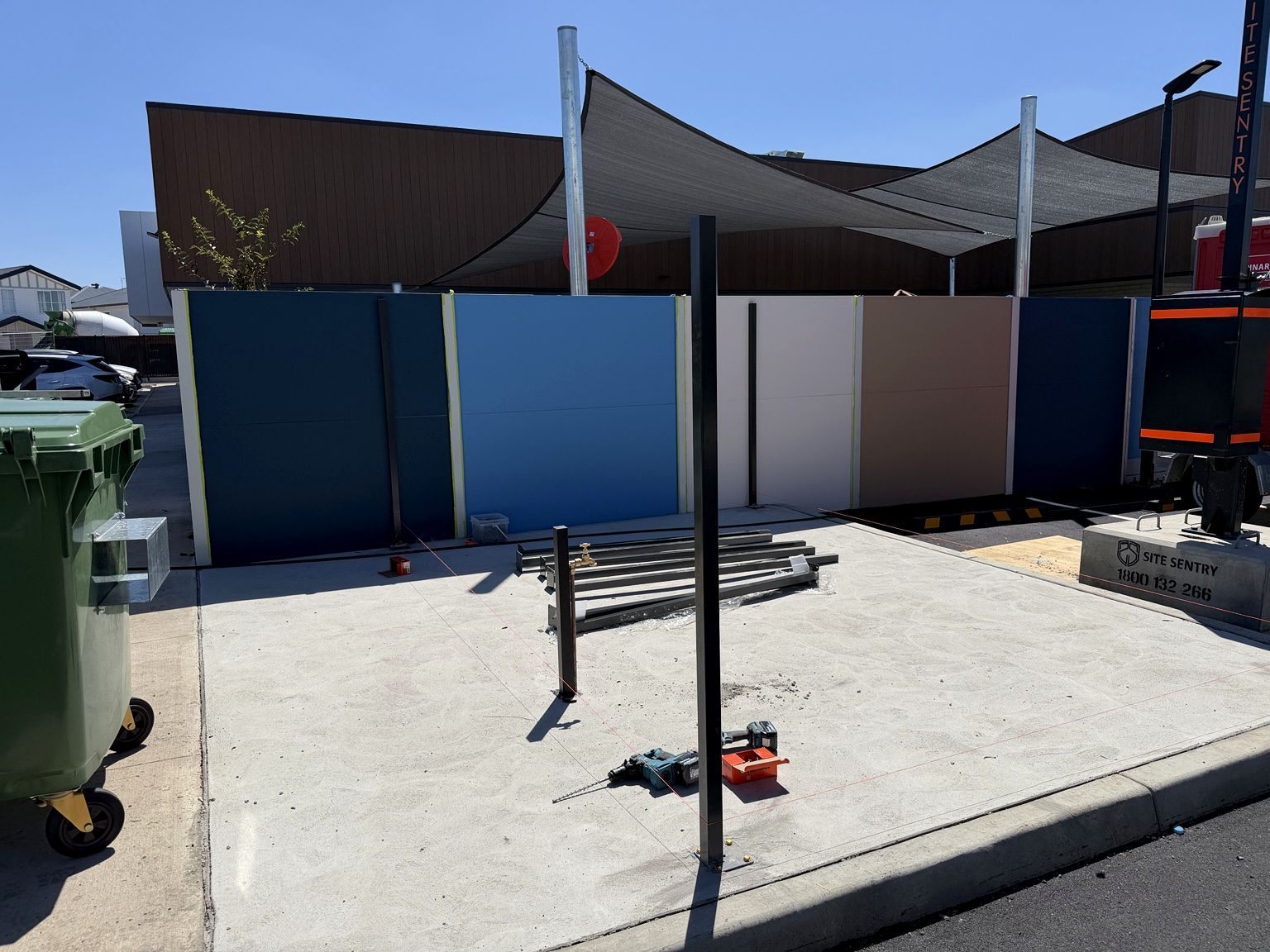 Craigieburn childcare project: SlimWall with slimwall painted to the project colour schedule, aluminium blade fencing, child-safe internal entry and muster-point gates. Photo 2 of 6.