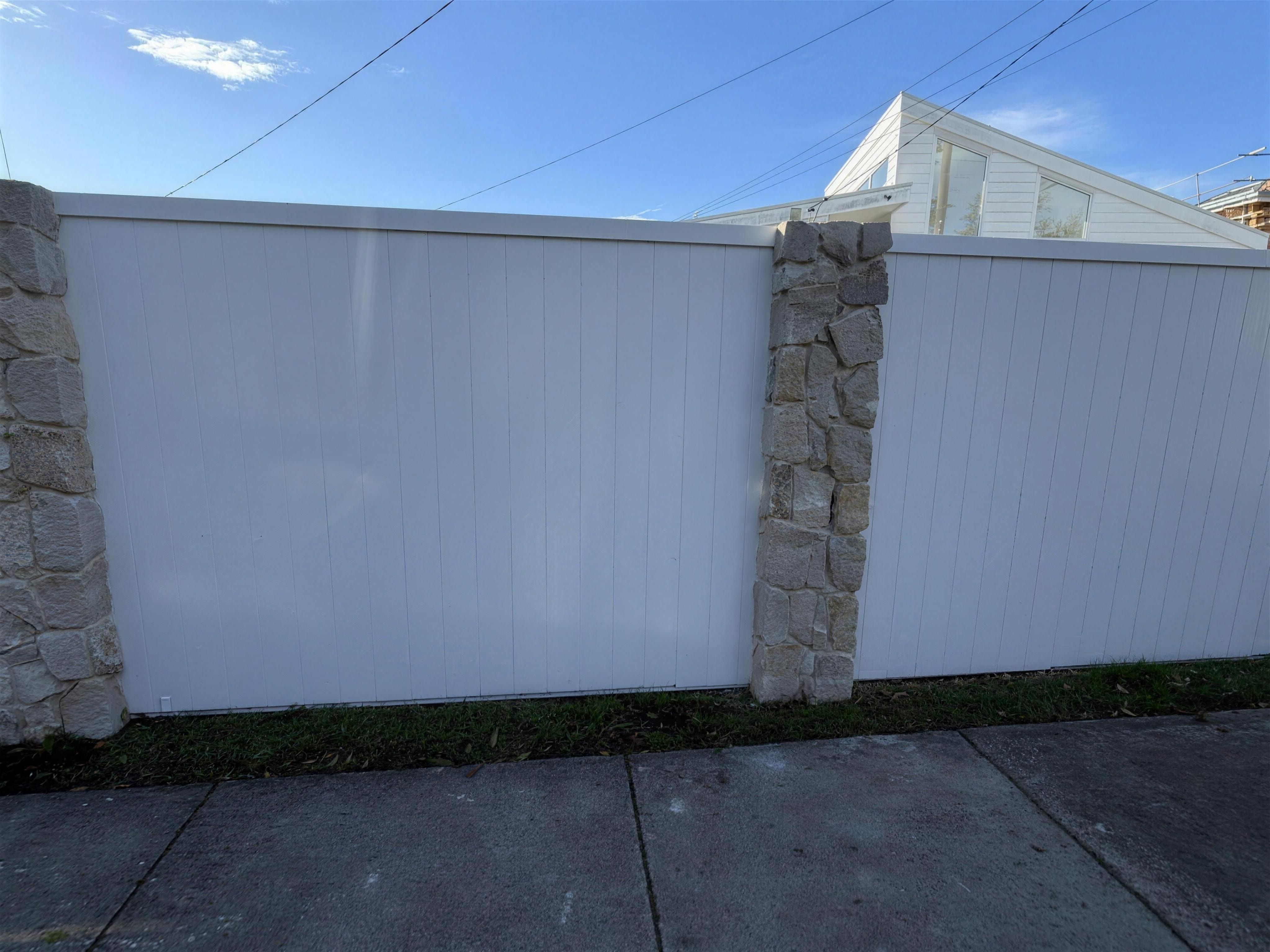 EstateWall panels between Santorini stone posts at Seaford.